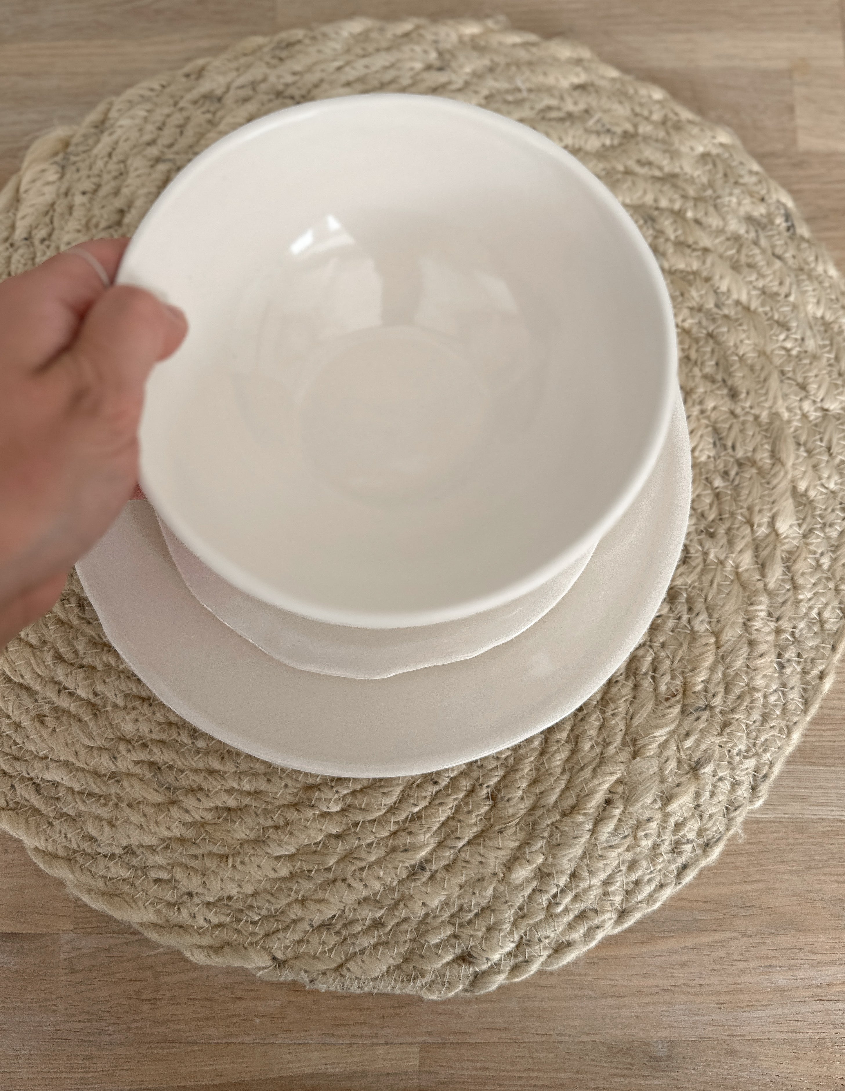 Handmade white stoneware dinnerware set with rustic raw edges