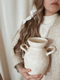 Handmade ceramic vase with handles and antique-inspired unearthed texture