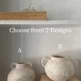 Handmade wide banded stoneware vessel with a raw clay exterior