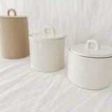 Handmade ceramic storage jar with a fitted lid, sample design