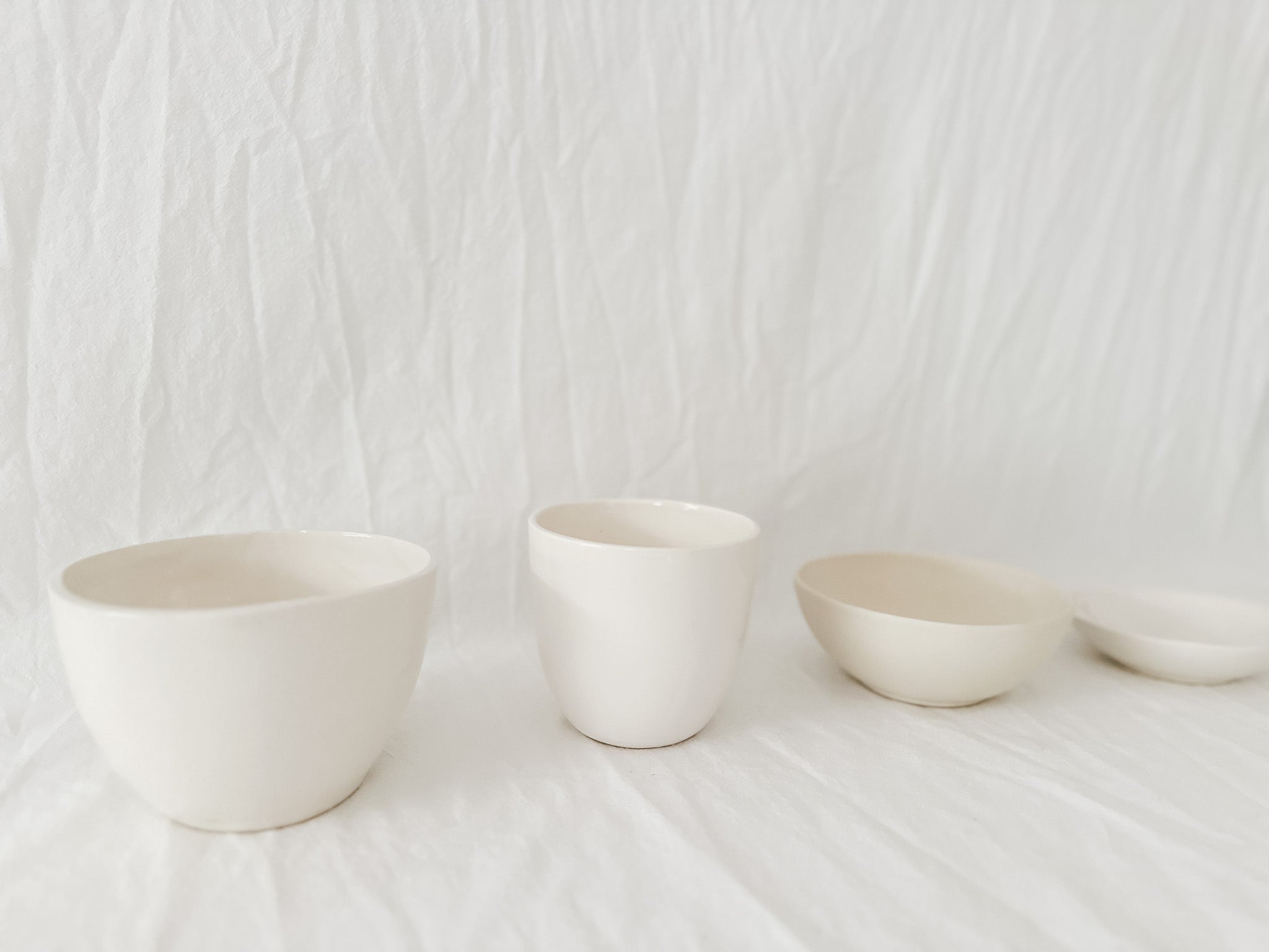 Glossy white handmade ceramic serving bowl on sale