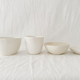 Handmade ceramic kitchen bowl in a glossy white glaze, seconds sale