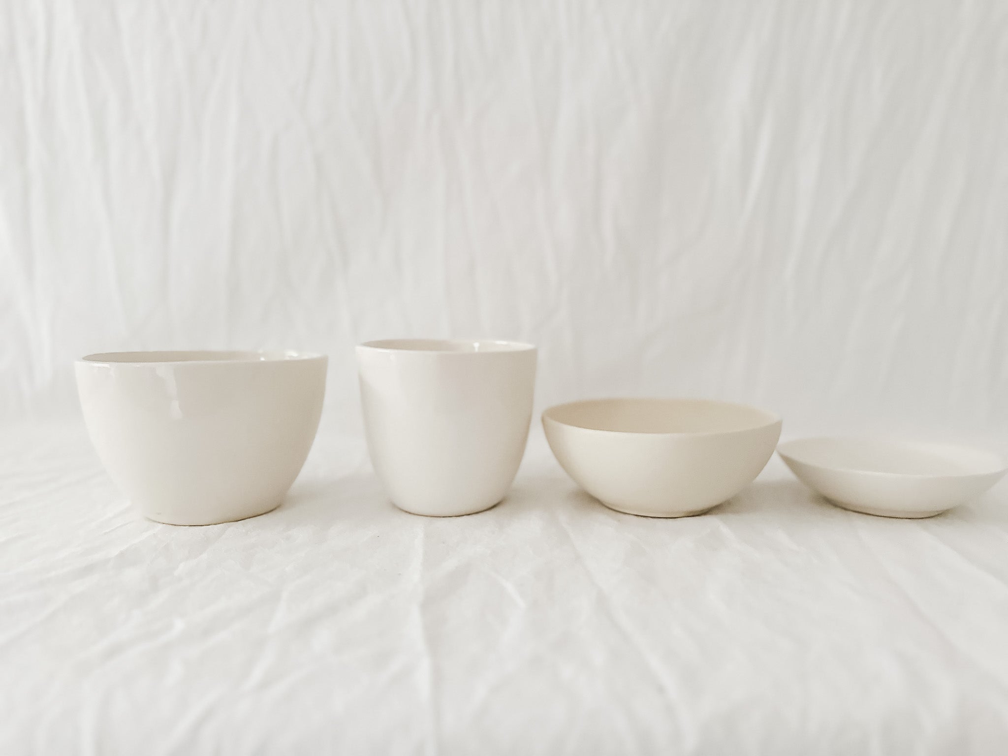 Handmade ceramic kitchen bowl in a glossy white glaze, seconds sale