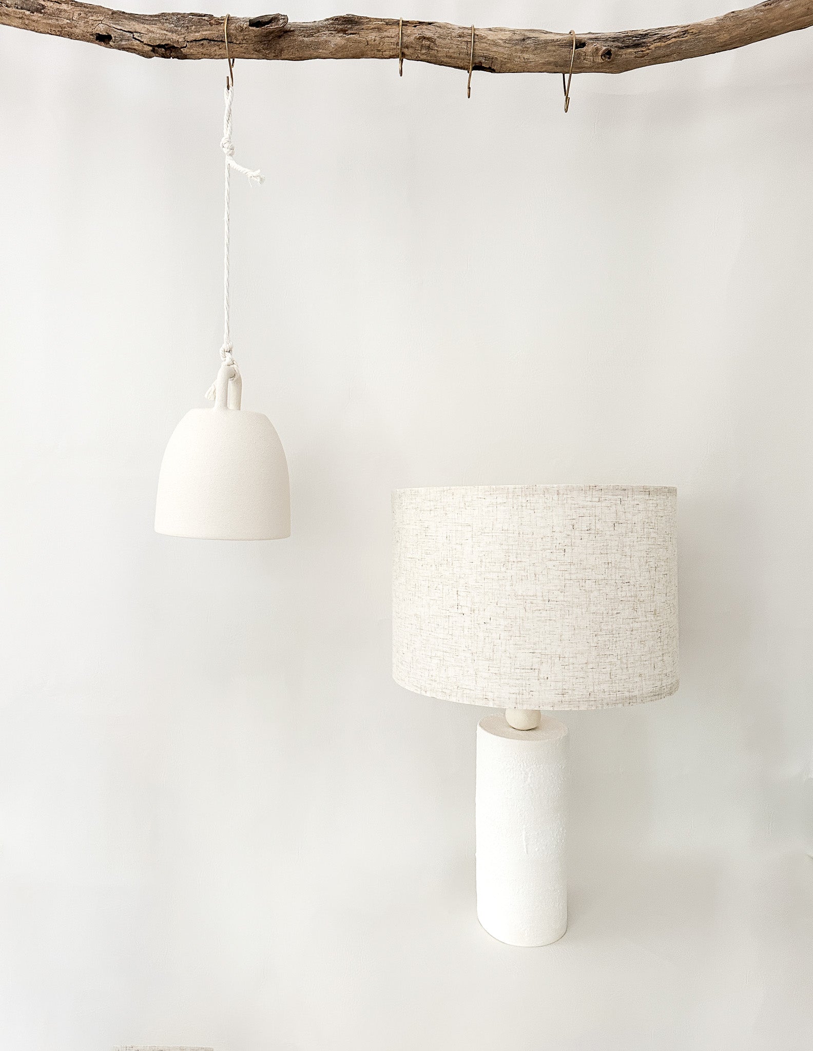 Handmade columnar ceramic lamp casting warm ambient light