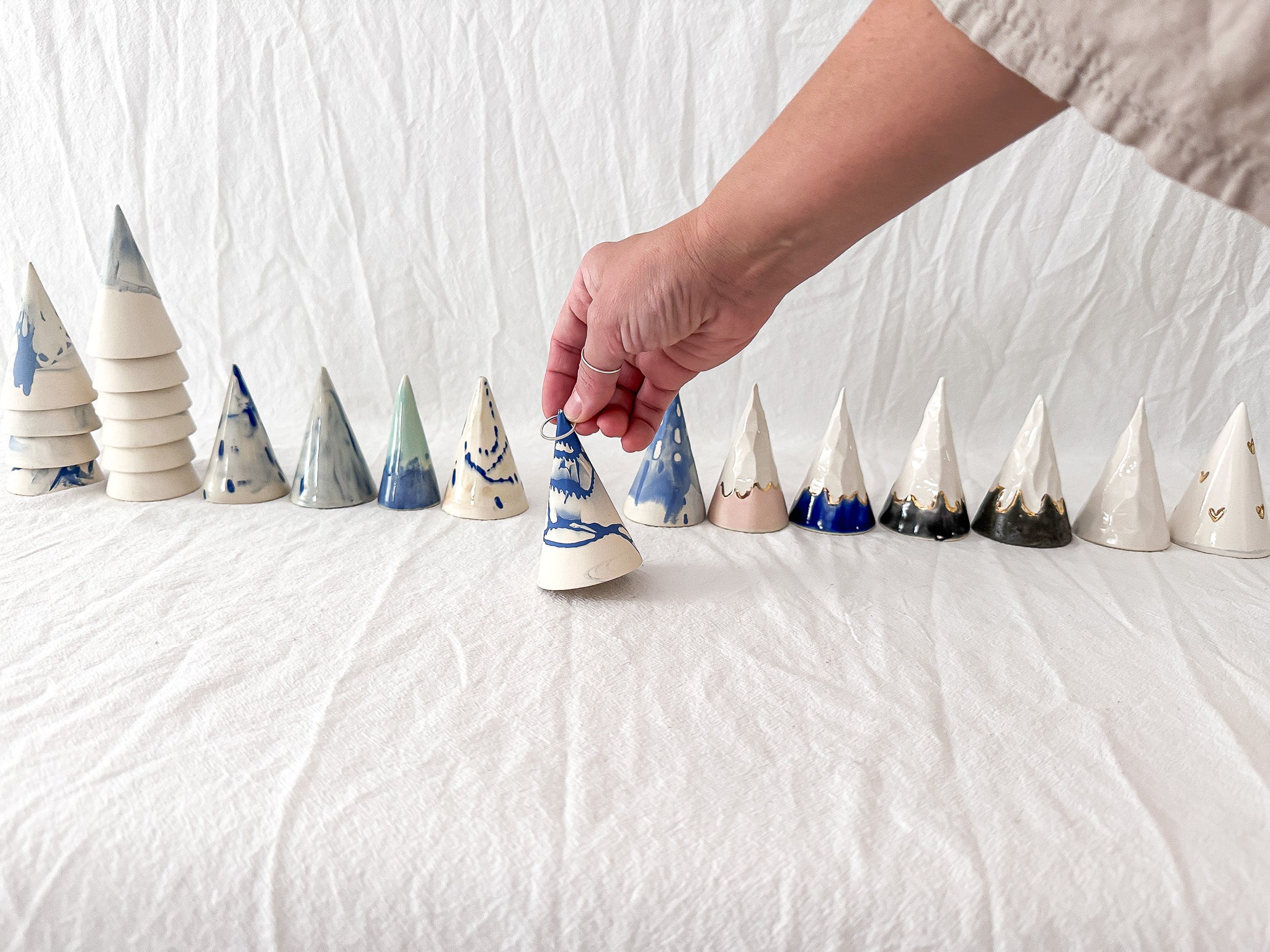 One-of-a-kind blue marbled ceramic ring cone, handmade in Cary, NC