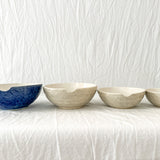 Handmade ceramic kitchen bowls in crackle white and cobalt blue glaze, dishwasher-safe seconds-sale pieces from Muddy Heart
