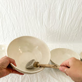 Handmade ceramic kitchen bowls in crackle white and cobalt blue glaze, dishwasher-safe seconds-sale pieces from Muddy Heart
