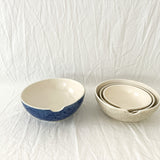 Handmade ceramic kitchen bowls in crackle white and cobalt blue glaze, dishwasher-safe seconds-sale pieces from Muddy Heart
