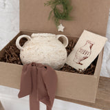 Handmade ceramic olive jar with a soft old-world texture in a neutral finish.