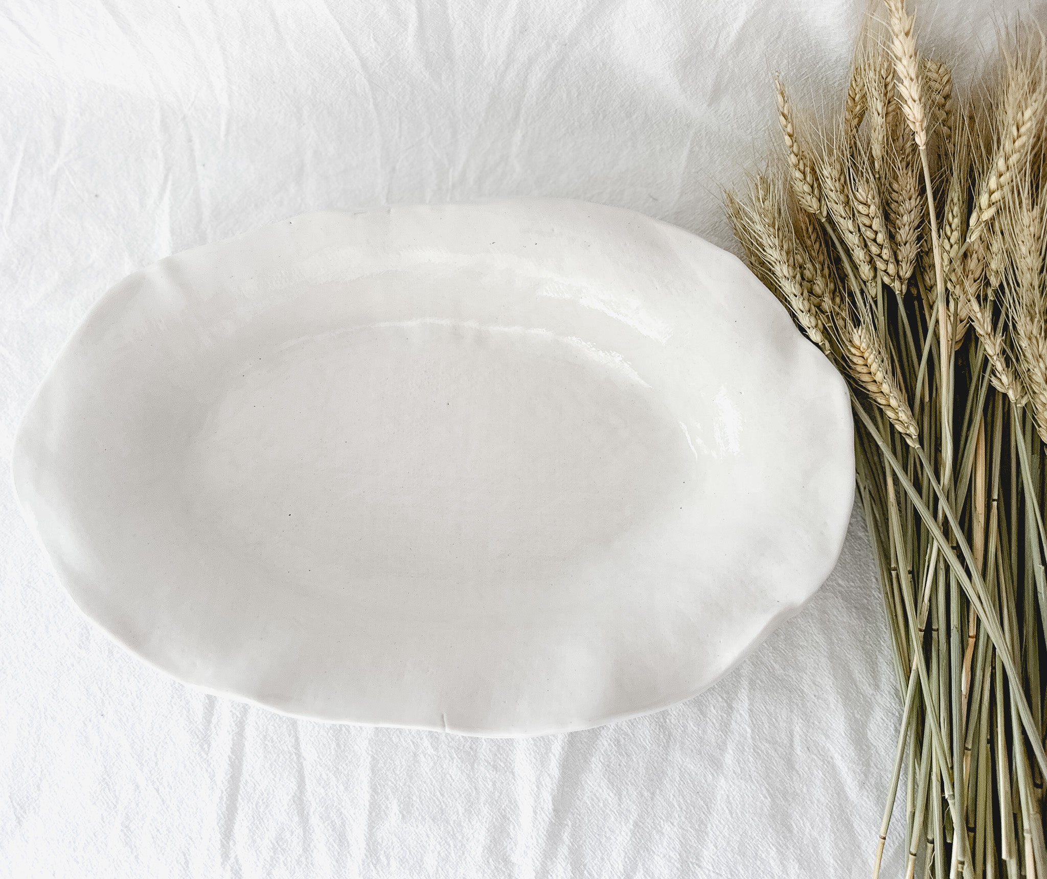 Large handmade rustic ceramic serving platter, 14 inches long, food-safe seconds-sale piece from Muddy Heart