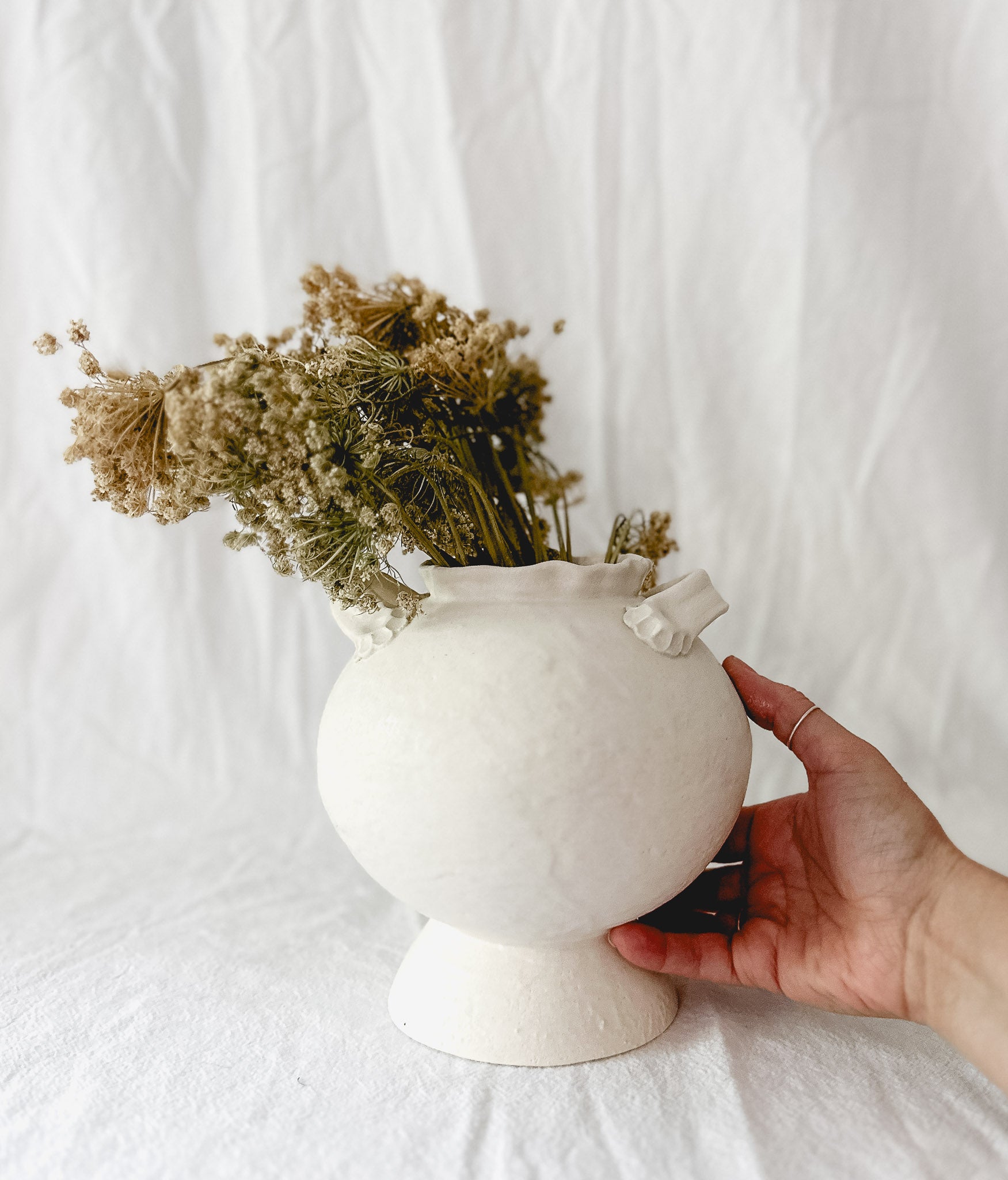 One-of-a-kind footed ceramic vase in frost-white glaze, 8.5 inches tall