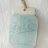 Handmade turquoise ceramic cheese and charcuterie board with a ball mason jar accent, seconds-sale piece from Muddy Heart
