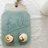 Handmade turquoise ceramic cheese and charcuterie board with a ball mason jar accent, seconds-sale piece from Muddy Heart