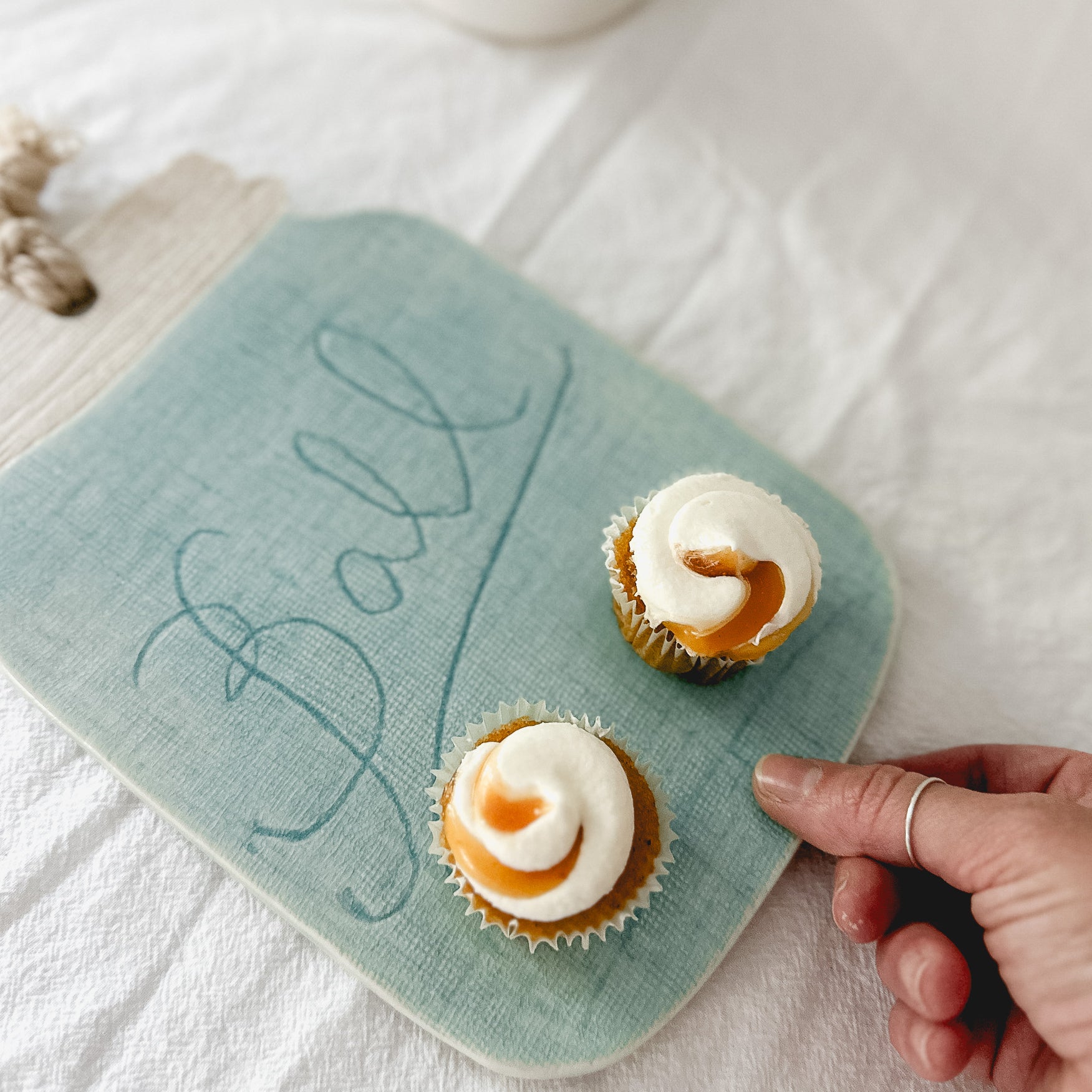 Handmade turquoise ceramic cheese and charcuterie board with a ball mason jar accent, seconds-sale piece from Muddy Heart