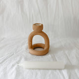 Handmade ceramic arc-shaped taper candle holder, seconds-sale piece from Muddy Heart