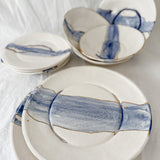 Handmade cobalt watercolor ceramic dinnerware with gold luster detailing