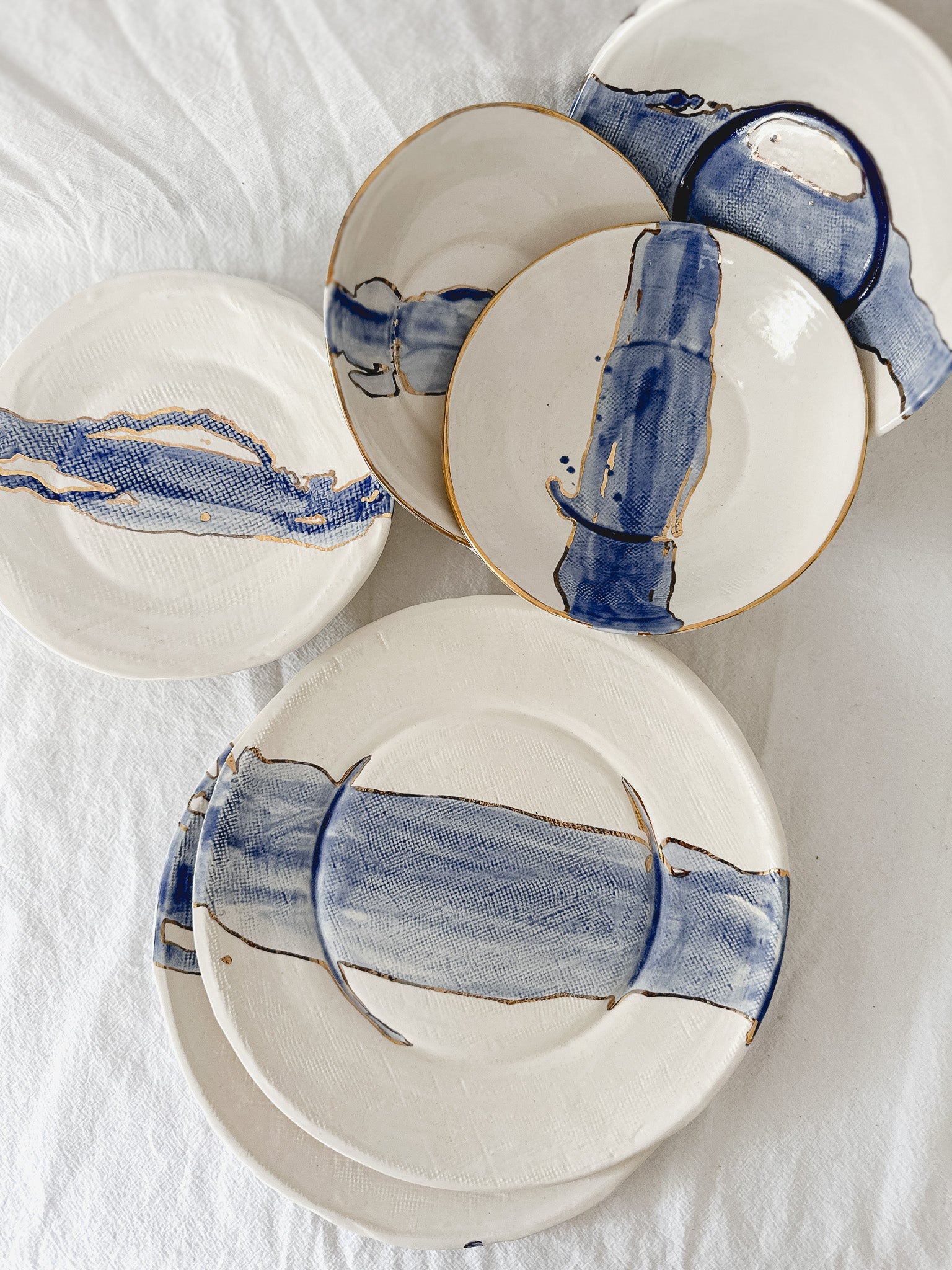 Gloss blue watercolor ceramic plate with a real 22k gold luster line