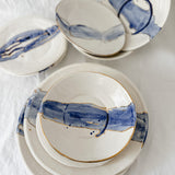One-of-a-kind cobalt watercolor ceramic dinnerware with 22k gold luster trim