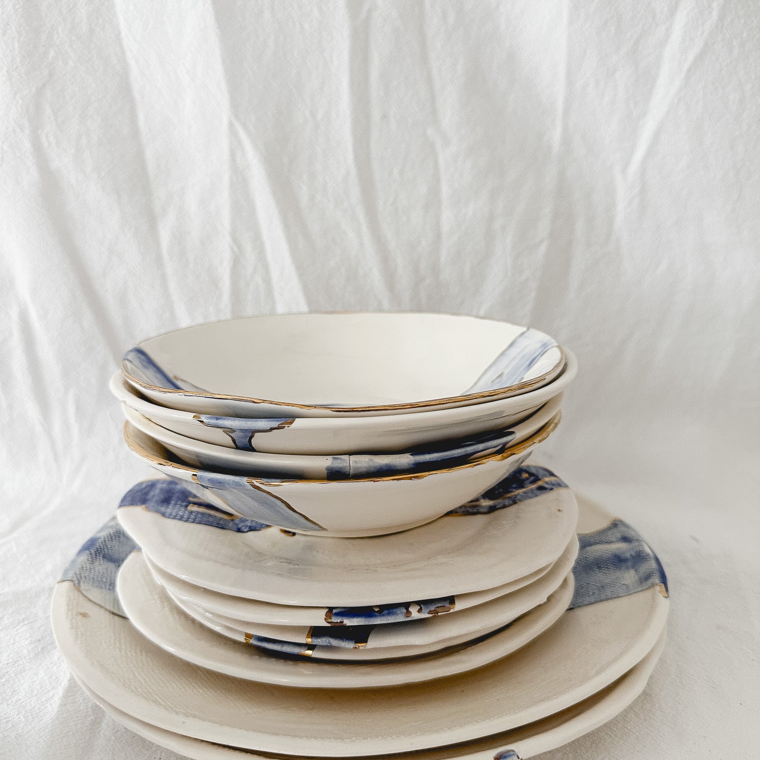 Gloss blue watercolor ceramic plate rimmed with real 22k gold luster