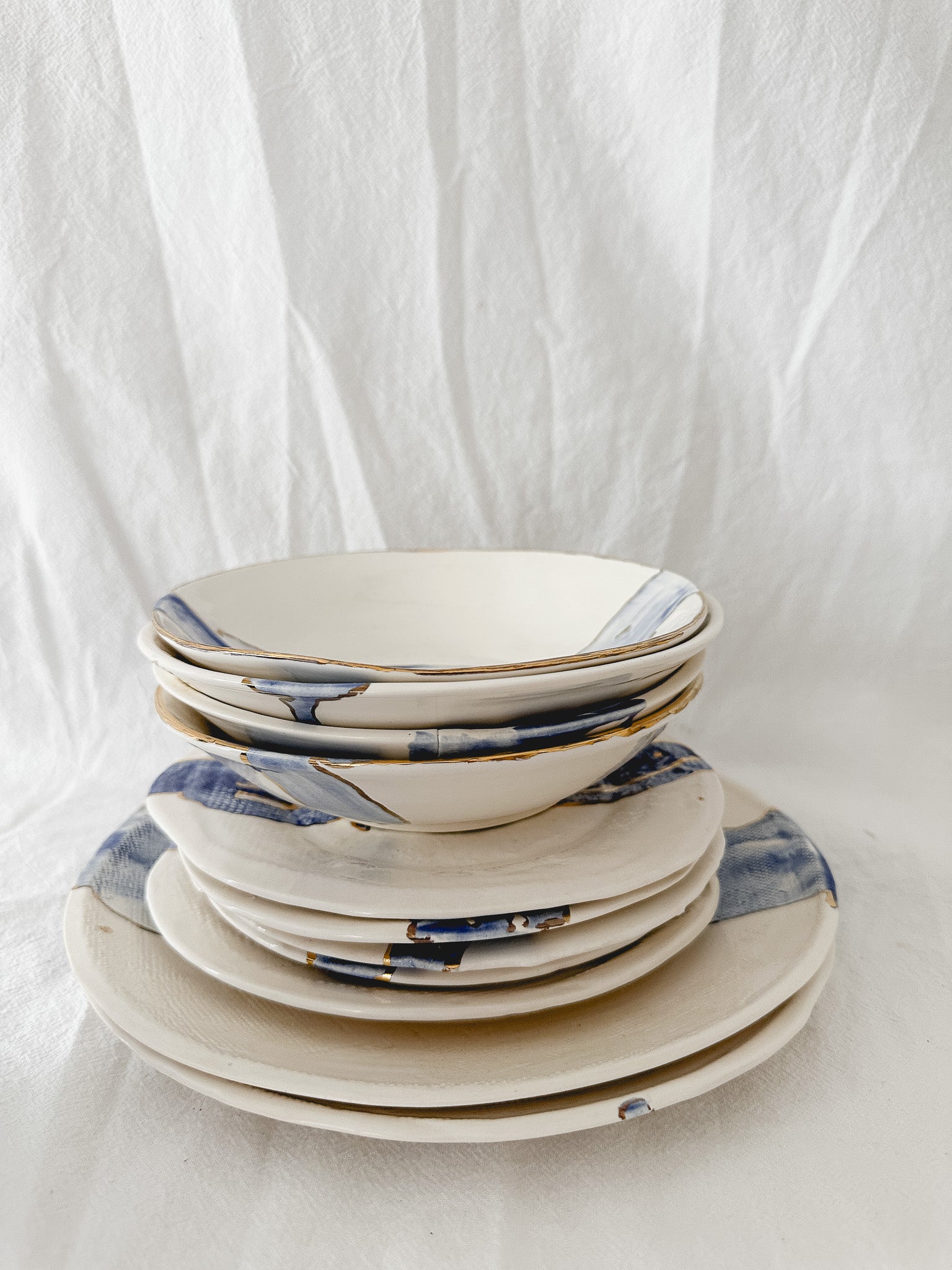 Gloss blue watercolor ceramic plate rimmed with real 22k gold luster