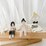 Small handmade ceramic doll figurines in assorted styles, one-of-a-kind seconds-sale collectibles from Muddy Heart