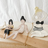 Small handmade ceramic doll figurines in assorted styles, one-of-a-kind seconds-sale collectibles from Muddy Heart