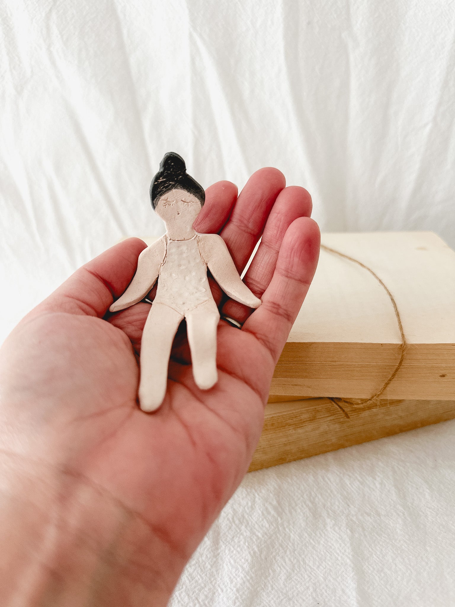 Small handmade ceramic doll figurines in assorted styles, one-of-a-kind seconds-sale collectibles from Muddy Heart