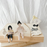Small handmade ceramic doll figurines in assorted styles, one-of-a-kind seconds-sale collectibles from Muddy Heart