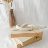 Handmade ceramic love knot decor object in textured white glaze, 12 inches long, one-of-a-kind piece from Muddy Heart