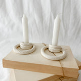 Handmade ceramic taper candle holder formed from interlocking loops, seconds-sale piece from Muddy Heart