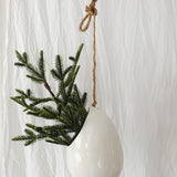 Handmade gloss white ceramic pod-shaped hanging vessel on an 18-inch rope, for flowers or trailing plants, seconds-sale piece from Muddy Heart