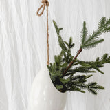 Handmade gloss white ceramic pod-shaped hanging vessel on an 18-inch rope, for flowers or trailing plants, seconds-sale piece from Muddy Heart