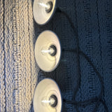 Three handmade ceramic pendant shades with a dimmable plug-in cord