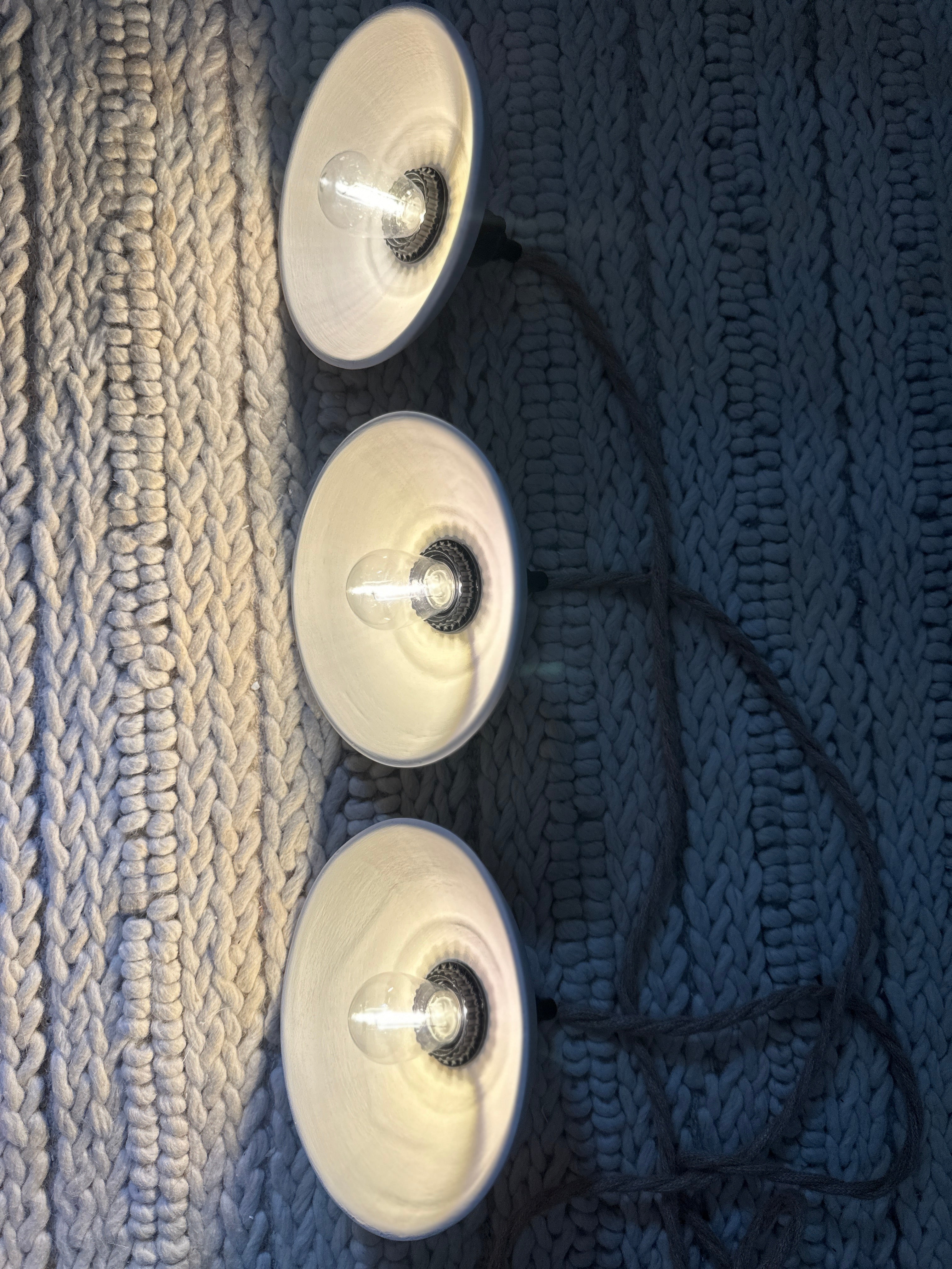 Three handmade ceramic pendant shades with a dimmable plug-in cord