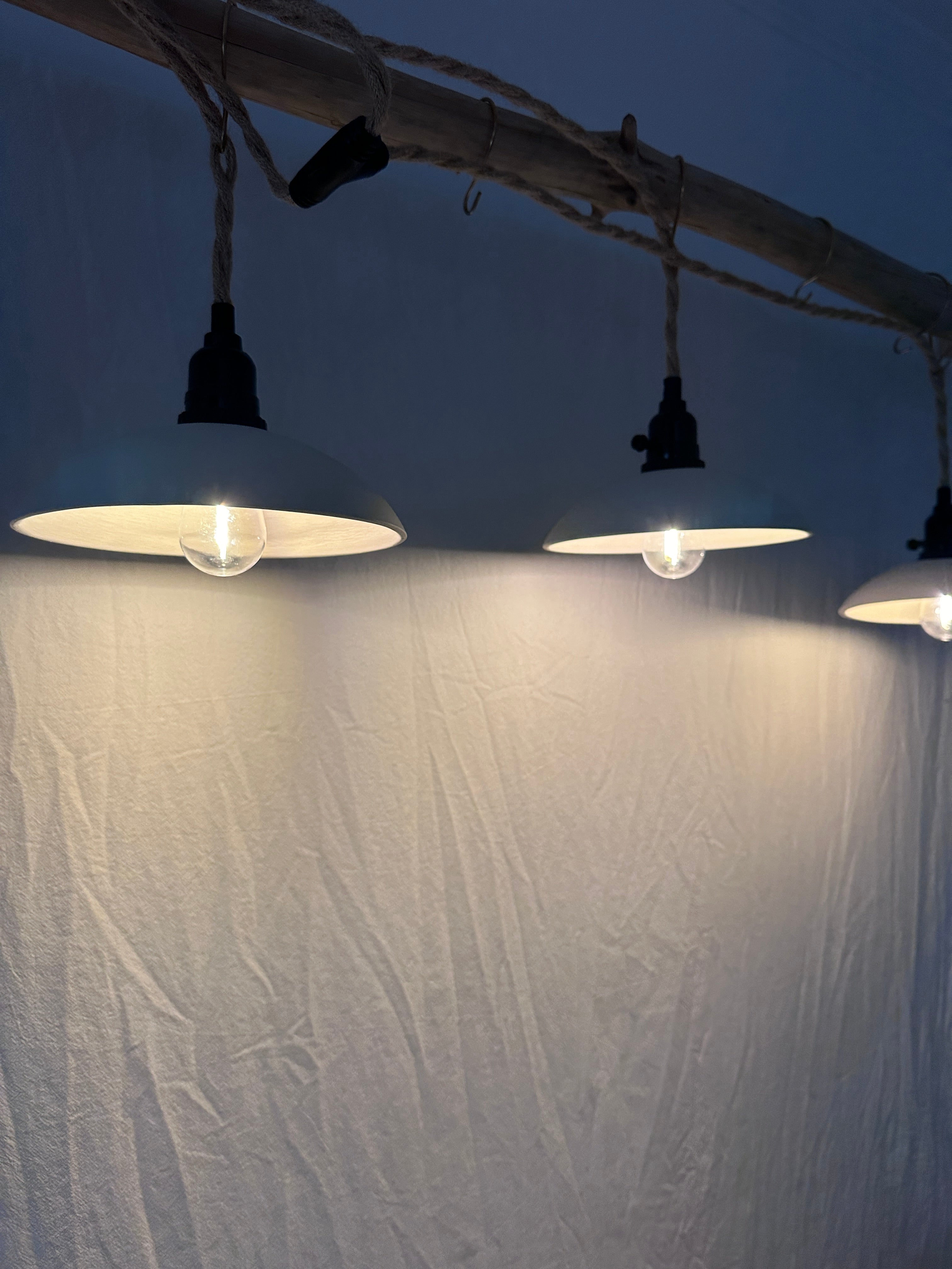 Open ceramic pendant lights hand-built in a Cary, NC studio