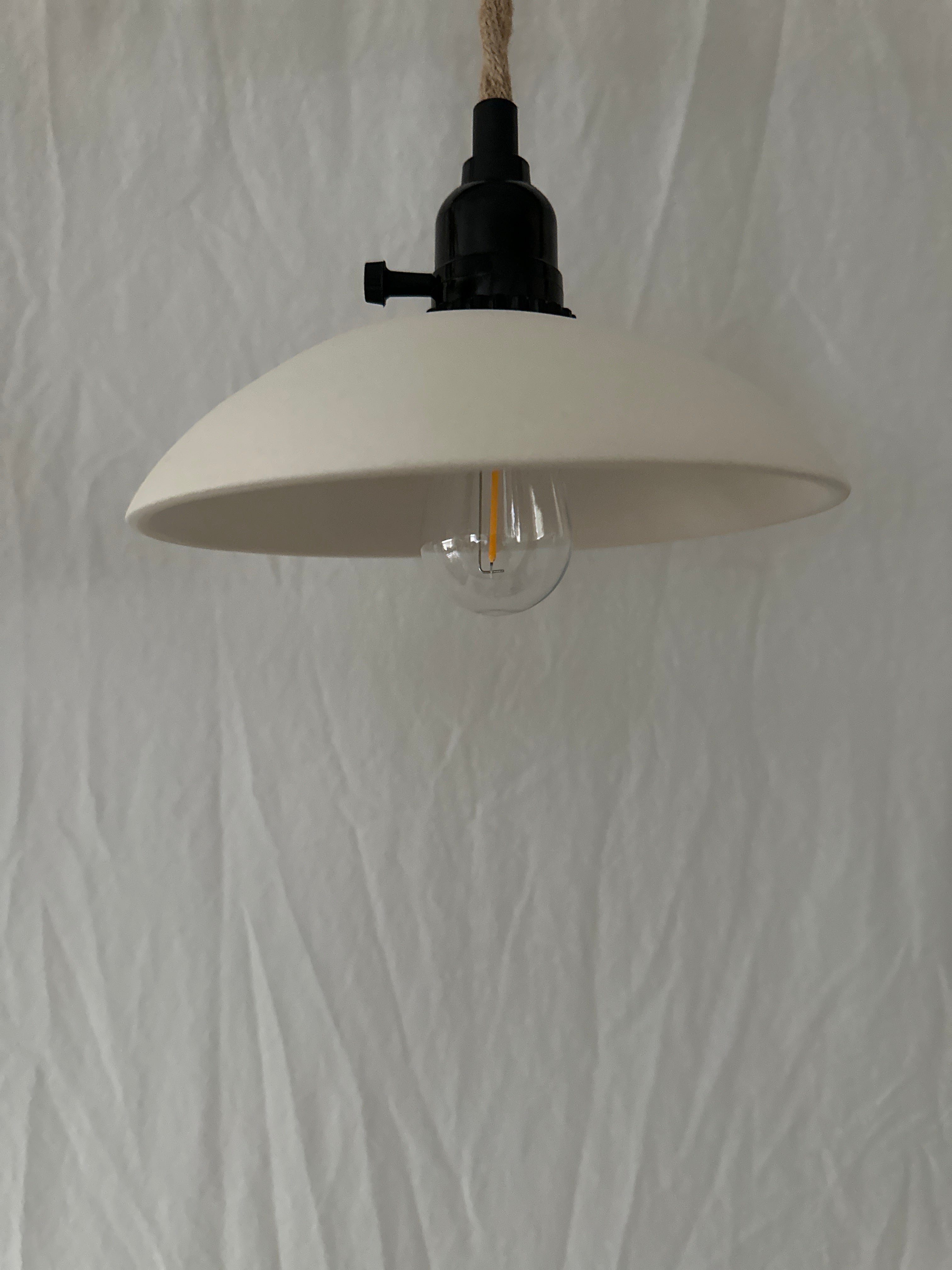 Handmade ceramic open pendant light cluster in a warm finish