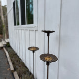 Handmade stoneware bird feeder and bath with pressed flower and leaf detailing for the garden.