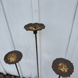Handmade stoneware bird feeder and bath with pressed flower and leaf detailing for the garden.