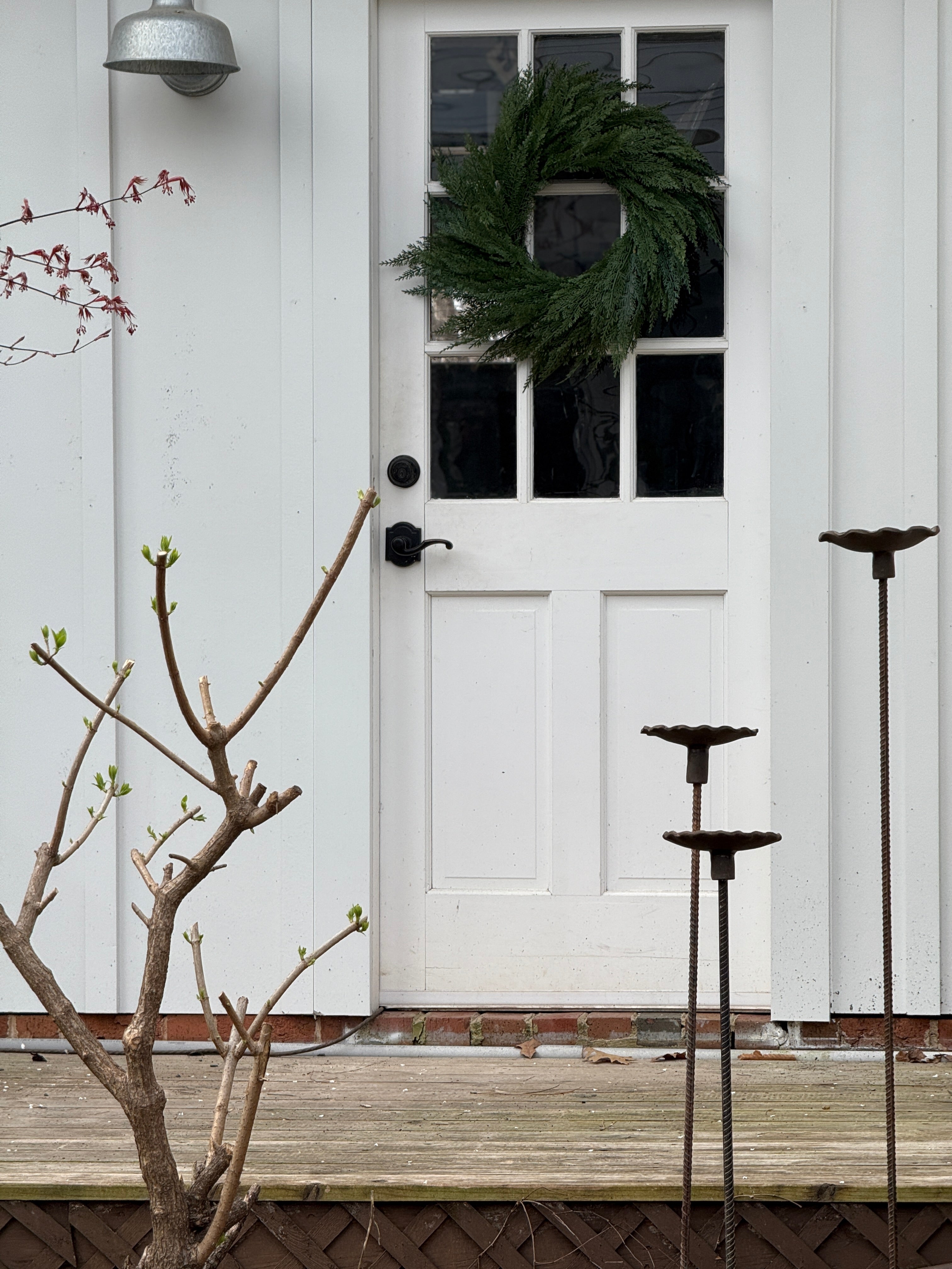Handmade stoneware bird feeder and bath with pressed flower and leaf detailing for the garden.