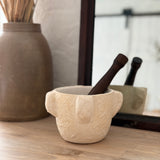 Handmade ceramic mortar and pestle inspired by ancient stone kitchen tools