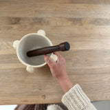 Handmade ceramic mortar and pestle inspired by ancient stone kitchen tools