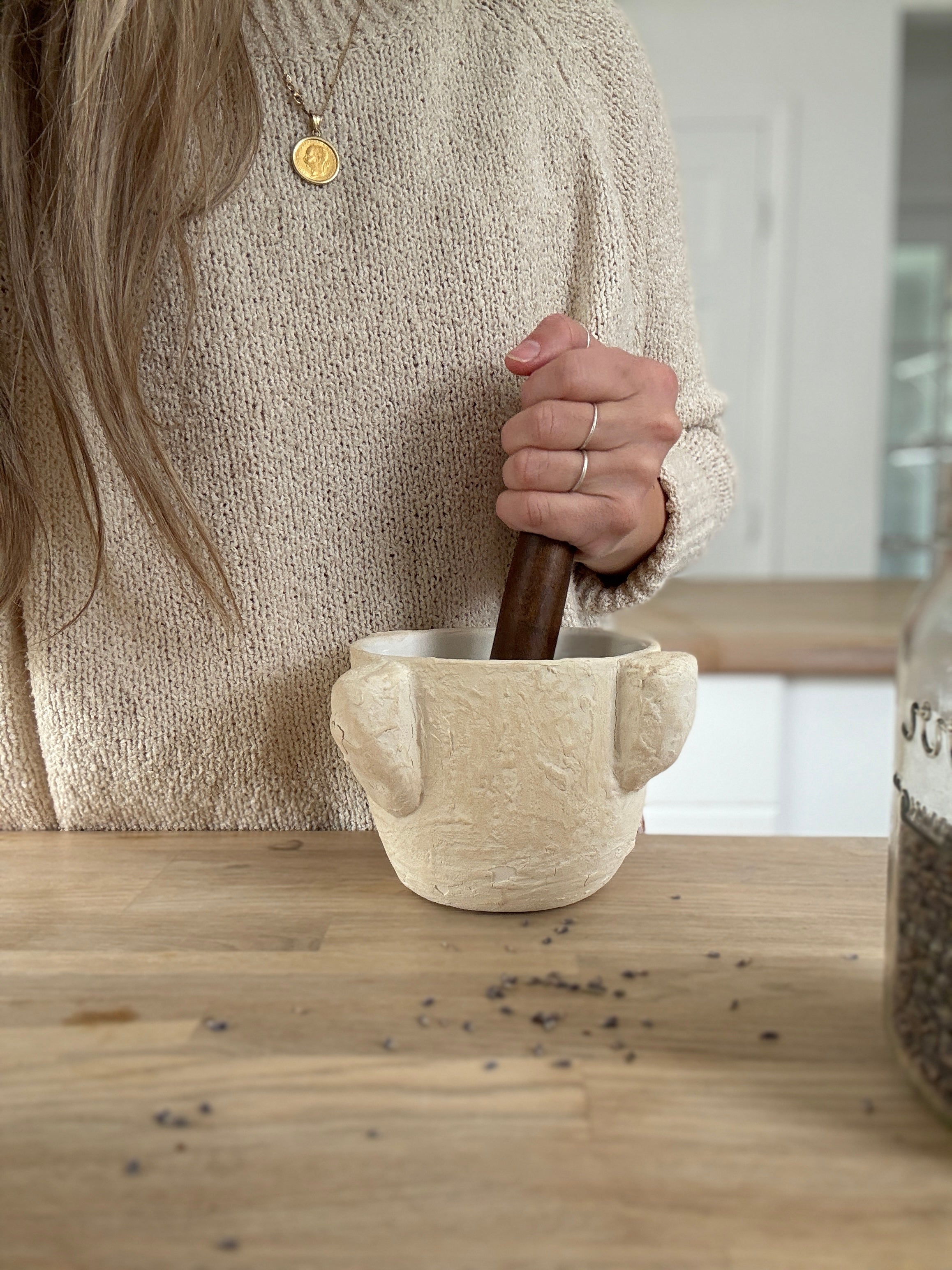 Handmade ceramic mortar and pestle inspired by ancient stone kitchen tools