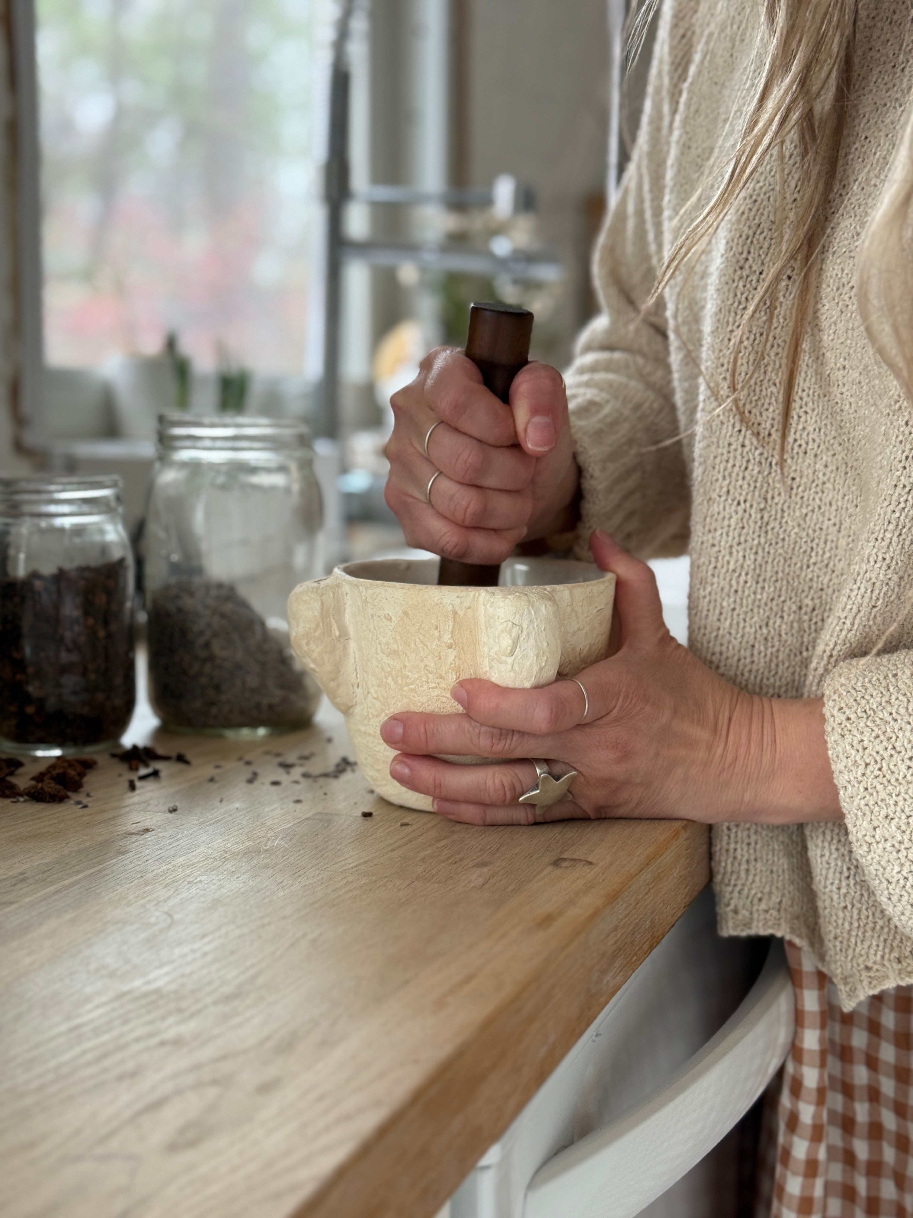 Handmade ceramic mortar and pestle inspired by ancient stone kitchen tools