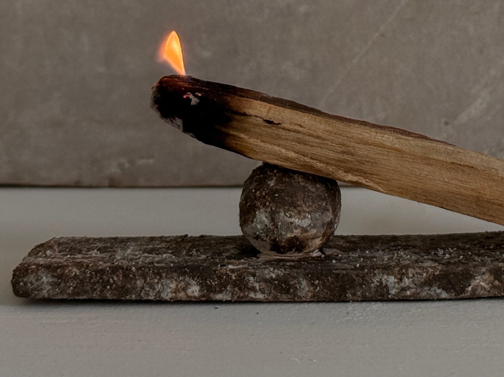 Aged geometric ceramic incense holder with an organic, asymmetrical form