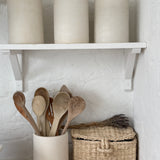 Handmade ceramic canister vase for kitchen utensils or flowers in a neutral finish