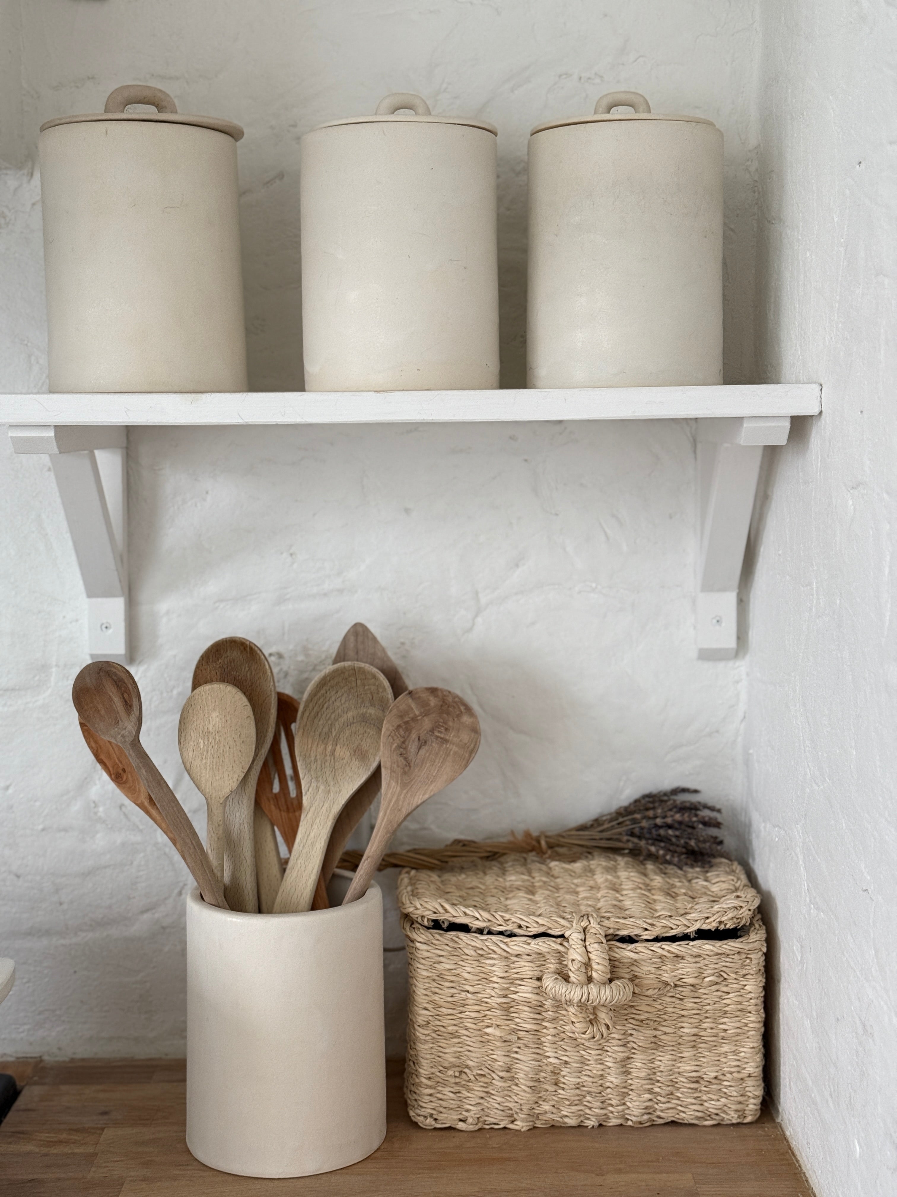 Handmade ceramic canister vase for kitchen utensils or flowers in a neutral finish