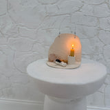 Handmade ceramic wall shelf altar for displaying crystals, candles, or palo santo.