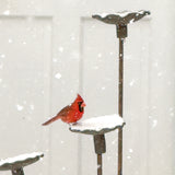 Handmade stoneware bird feeder and bath with pressed flower and leaf detailing for the garden.