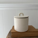Handmade small stoneware canister with a fitted lid for spices, tea, or coffee