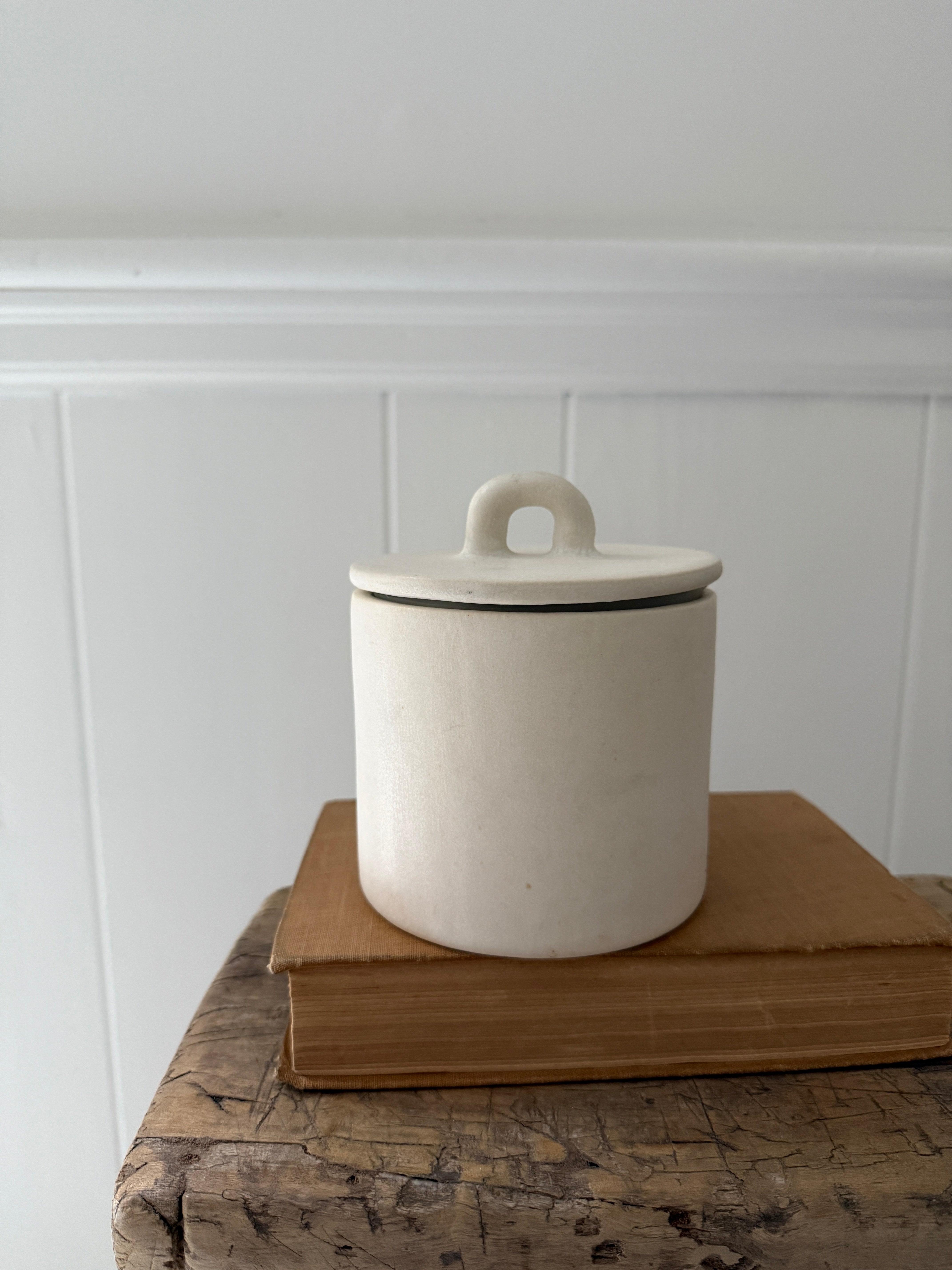 Handmade small stoneware canister with a fitted lid for spices, tea, or coffee